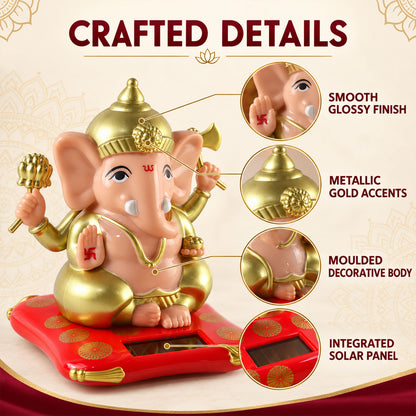A Ganesha idol with peach and gold accents on a red cushion, with detailed close-ups of its features.