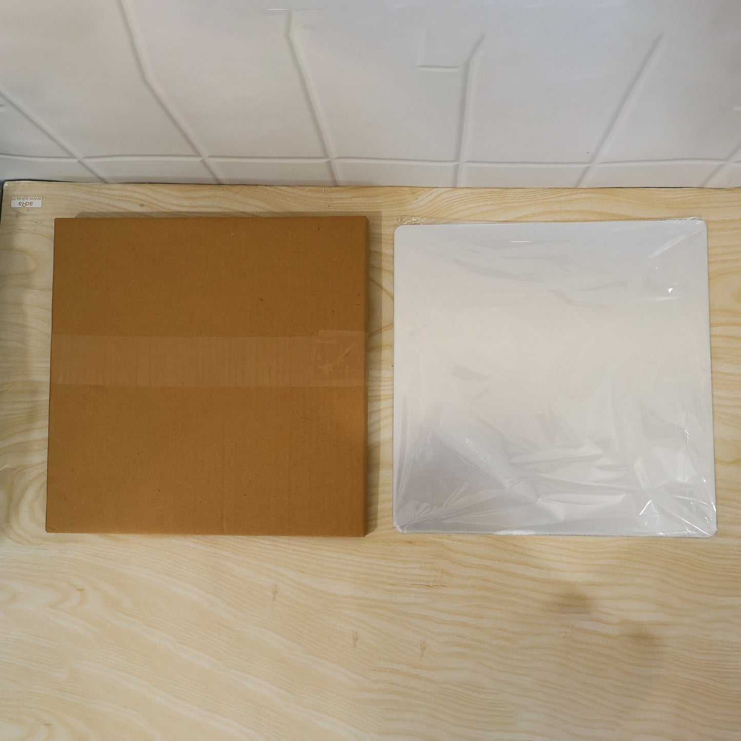 Live product photo with brown box
