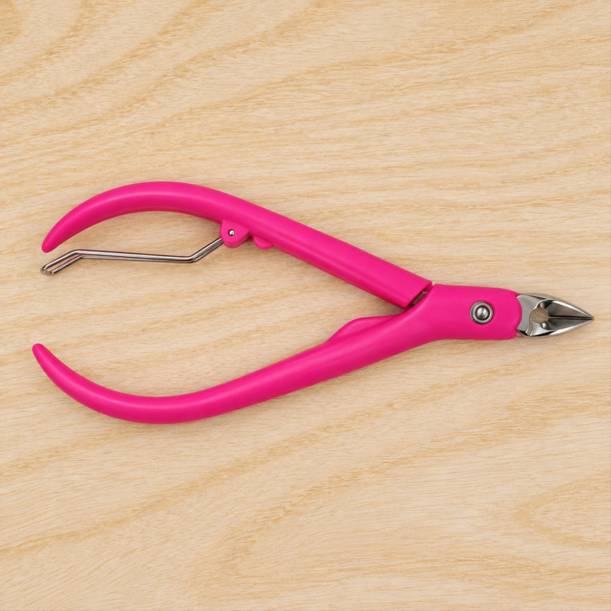 Cuticle nipper with curved handles and spring mechanism 9