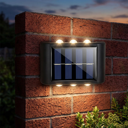 Solar LED wall light mounted on brick wall