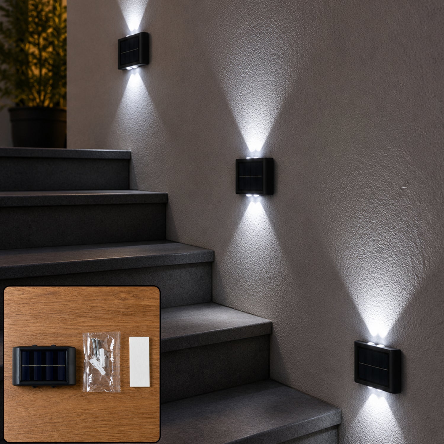 Solar wall fence light illuminating outdoor stairs