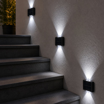 Solar wall lights installed beside stairs