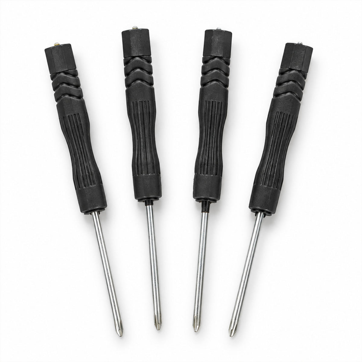Four mini screwdrivers on white background