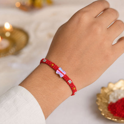 Red Braided Rakhi with an Iridescent Bow-Tie Shaped Crystal Bead