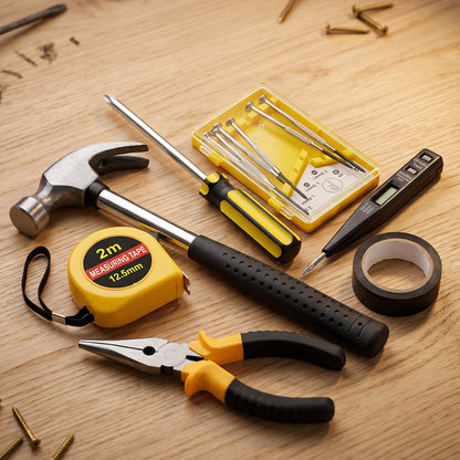 Hammer pliers tape and screwdriver tools for home repair
