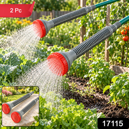 Two grey and red watering nozzles spray water onto green plants, with a smaller inset showing the two nozzles.