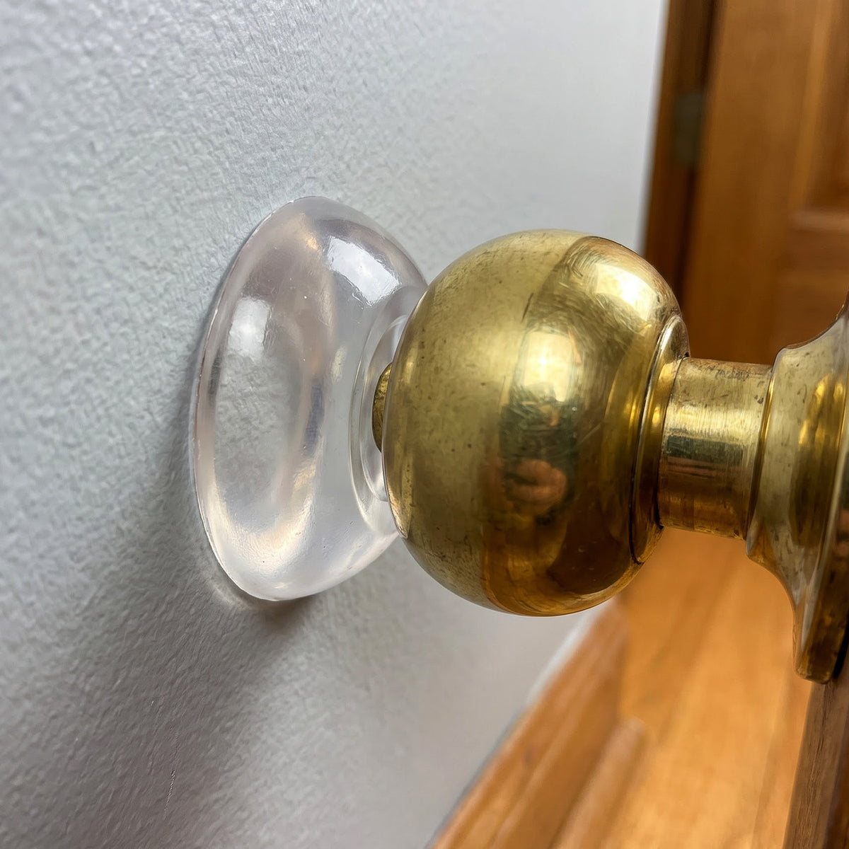 Door knob wall protector in use