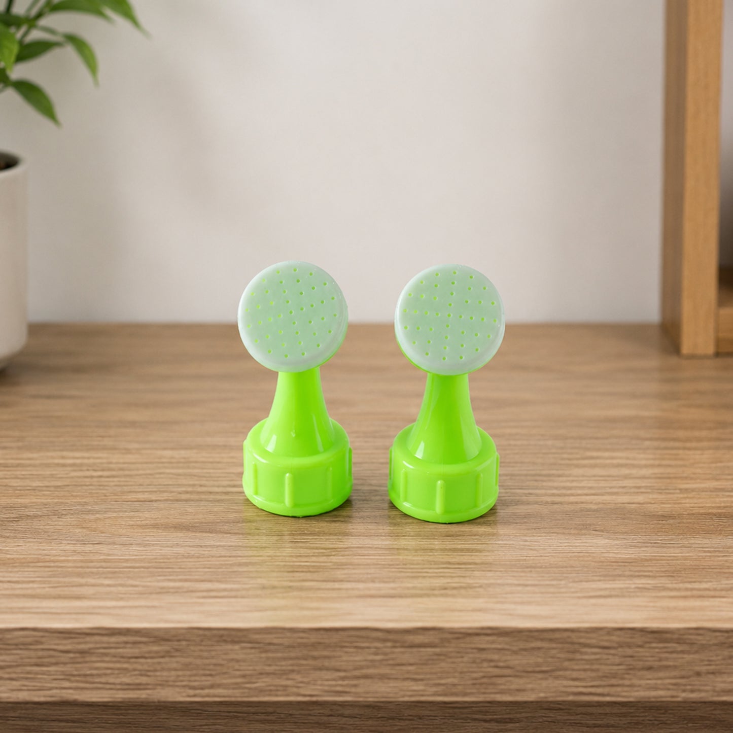 Green plastic bottle watering nozzle set
