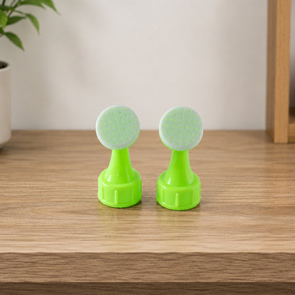 Green plastic bottle watering nozzle set