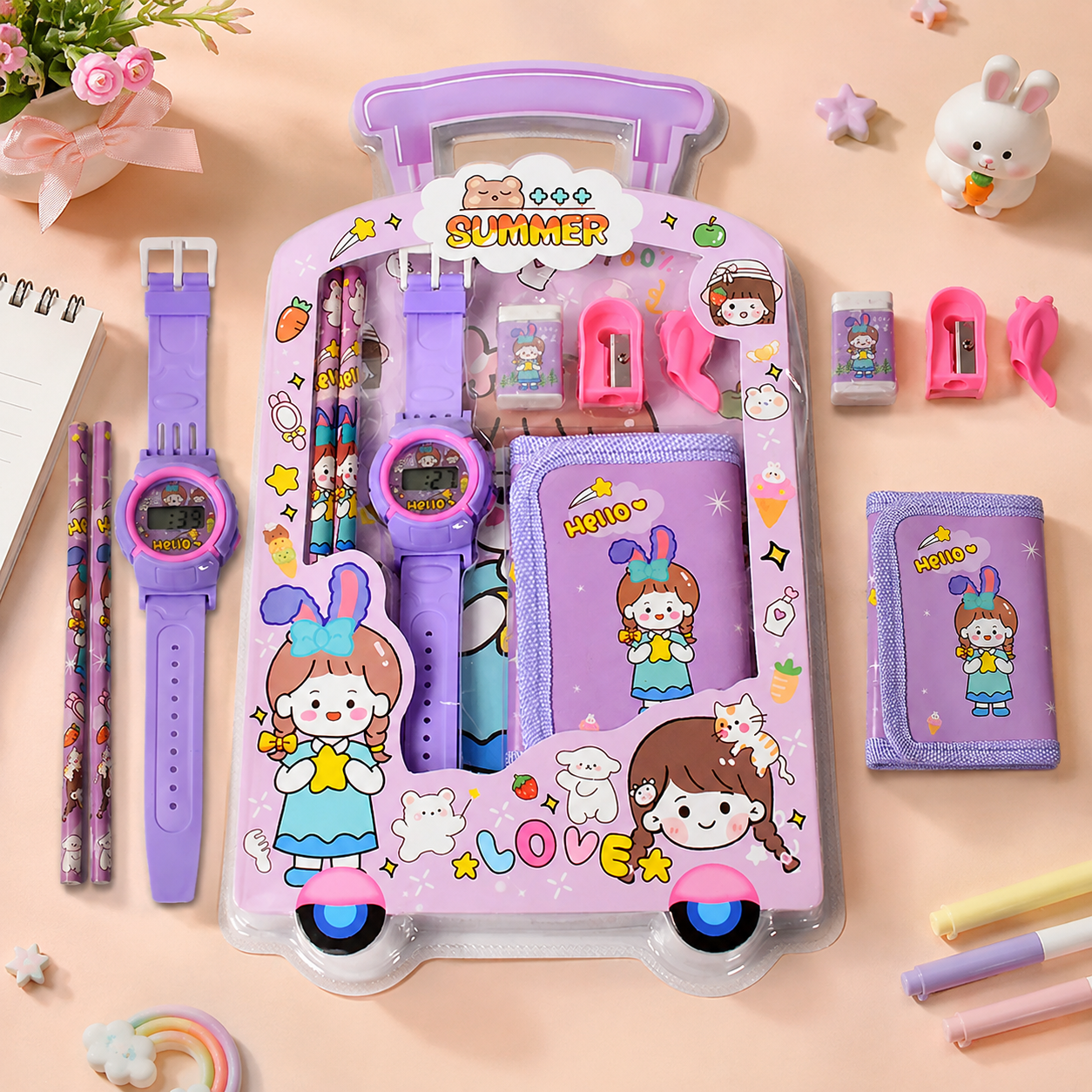 A purple stationery set in a trolley-shaped package, including a watch, pencils, eraser, sharpener, and wallet, on a pink