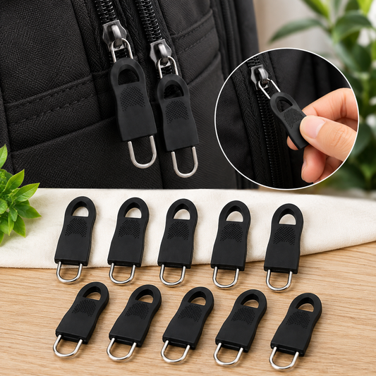 Two black rubber zipper pull tabs attached to a black bag, with an inset showing a hand attaching one.