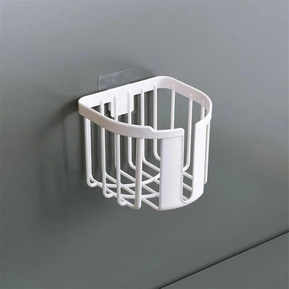 Adhesive toilet paper holder mounted on wall
