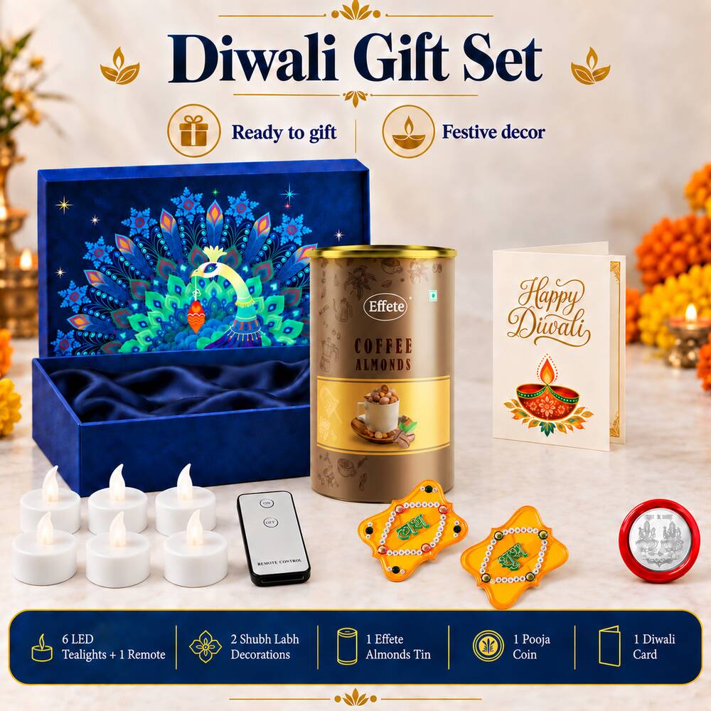 A Diwali gift set with a blue peacock box, coffee almonds, a greeting card, six LED tealights, a remote, two yellow Shubh