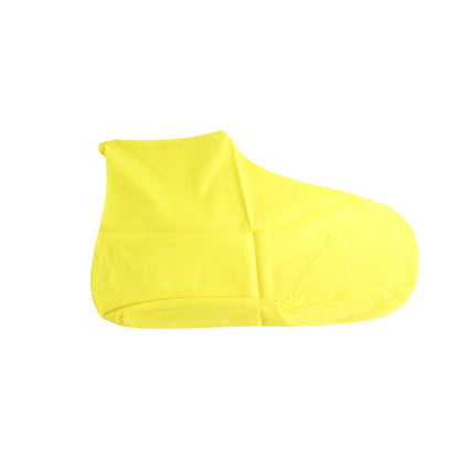 A single yellow silicone shoe cover with a textured sole is displayed on a white background.