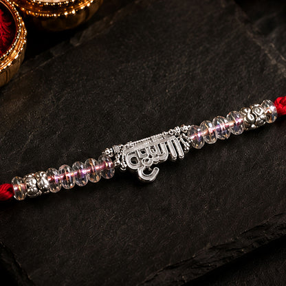 Silver Bhaiya Name Rakhi with Crystal Beads, Red Thread and Sparkling Detail
