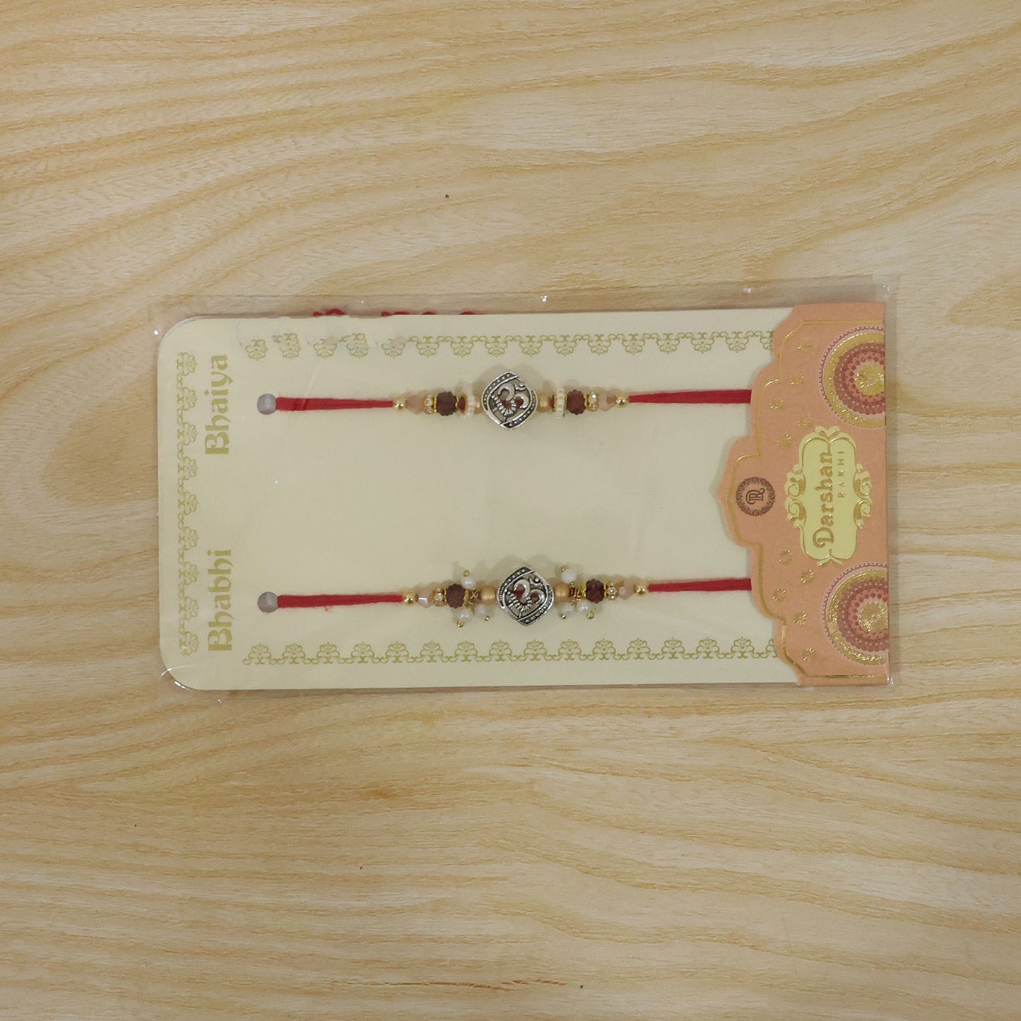 Om Face Designer Rakhi Set for Brother & Couple Rakhi with Pearl Beads and Red Thread