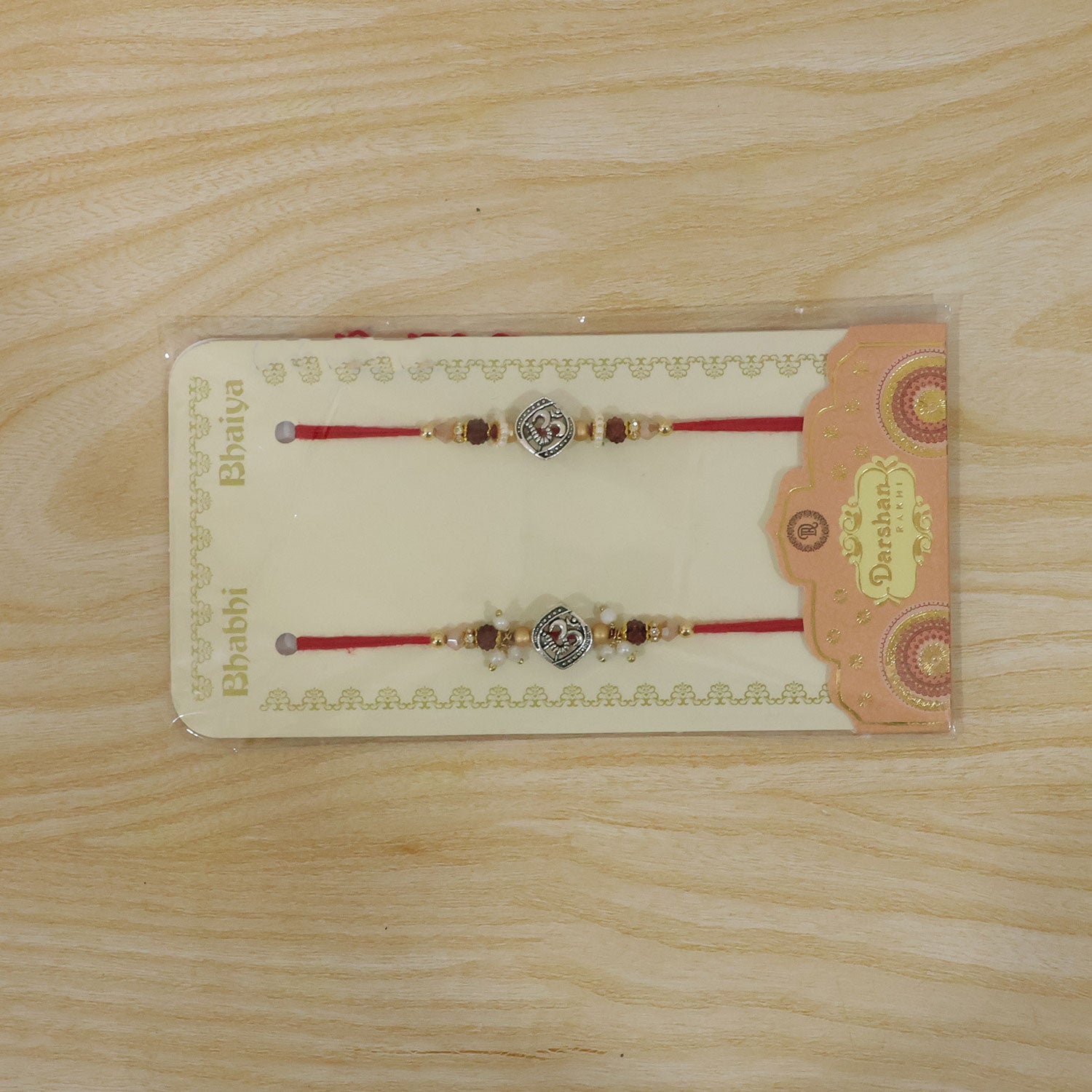 Om Face Designer Rakhi Set for Brother & Couple Rakhi with Pearl Beads and Red Thread