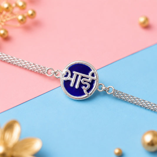 Silver Chain Rakhi with blue round design, displayed on a white background.
