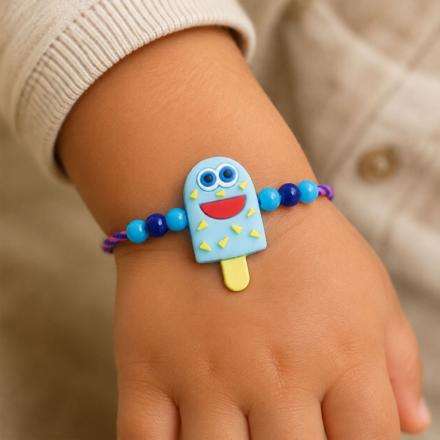 Blue Popsicle Character Rakhi with Chocolate Almonds, Pack of 2