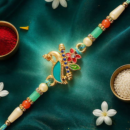 Teal Peacock Enamel Pendant Rakhi with Kundan Flower Accent