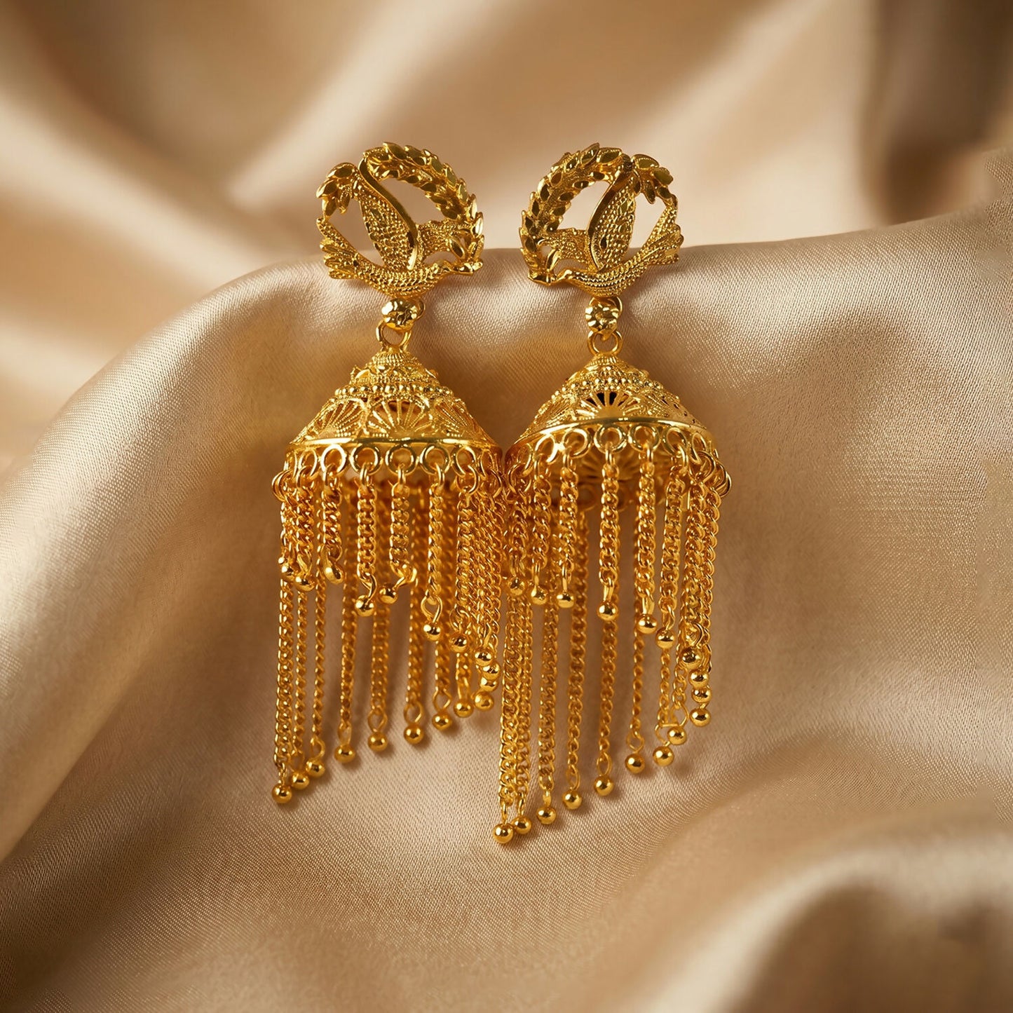 Golden Leaf Tassel Jhumka Earrings artistic angle