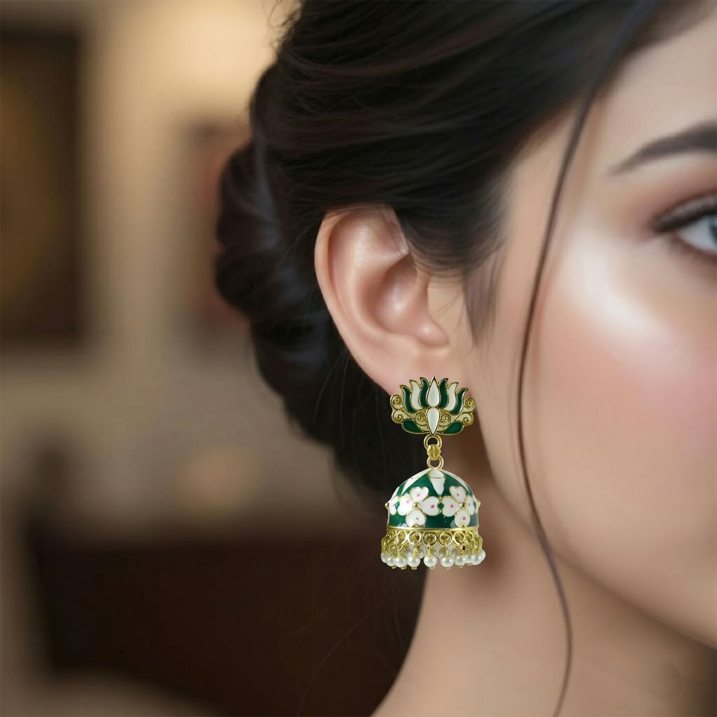 Side view of traditional green lotus jhumka earrings