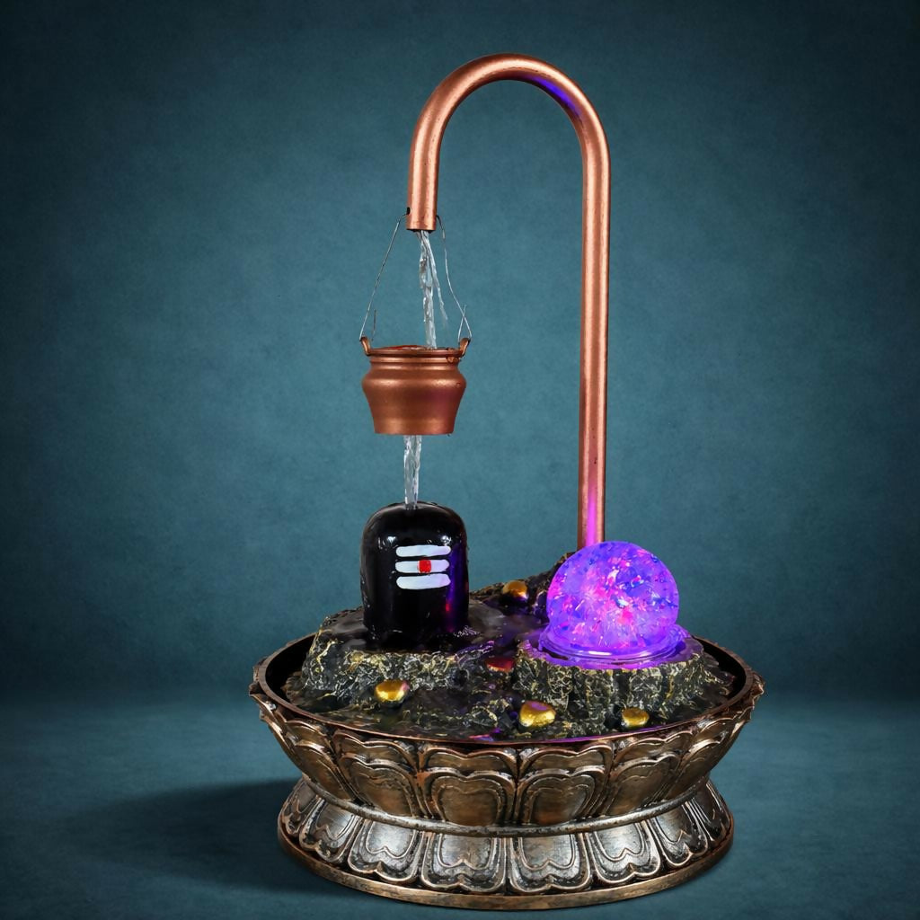 Side view of Shivling tabletop water fountain with flowing water