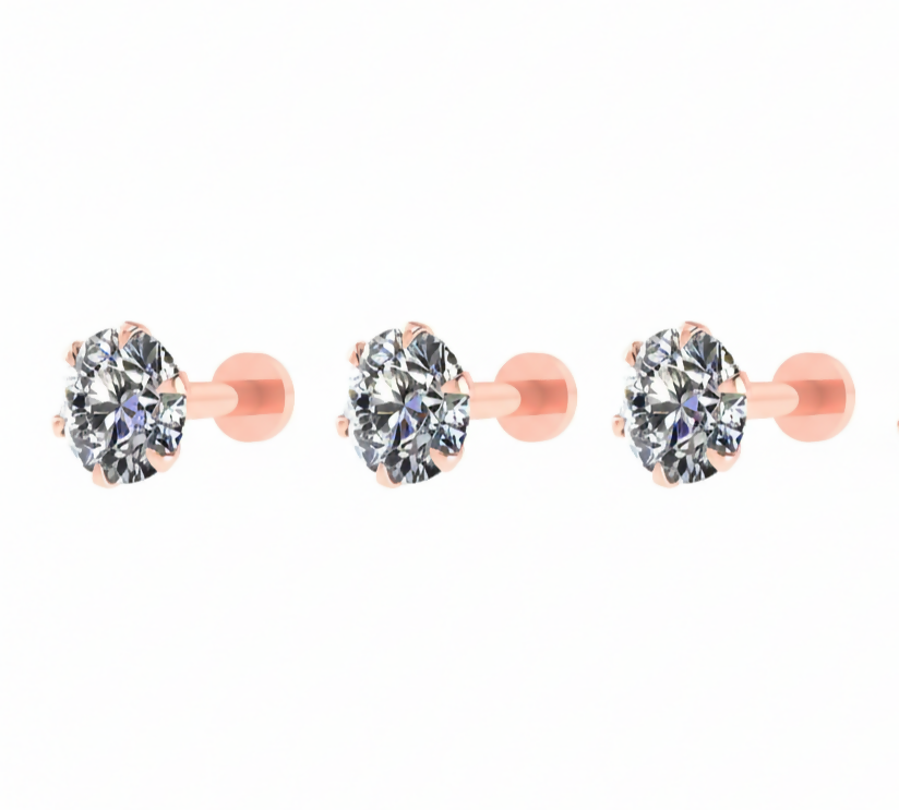 Set of three rose plated flat-back stud earrings for versatile ear stacking