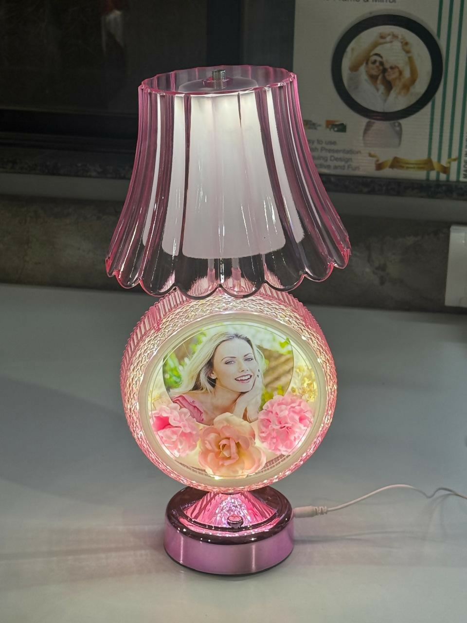 Elegant round photo table lamp with illuminated photo display
