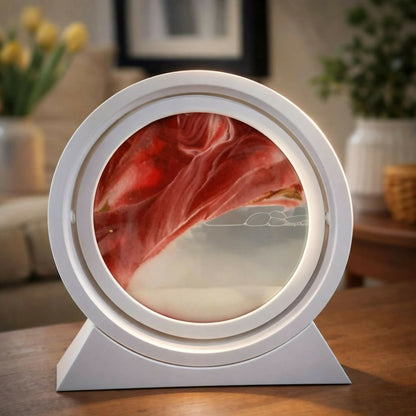 Side view of round sand art LED lamp with glowing light