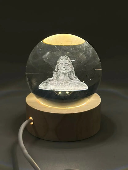 Close-up of 3D Adiyogi Shiva design inside crystal ball lamp