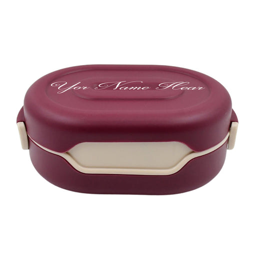 Pink stainless steel lunch box with three compartments and spoon slot