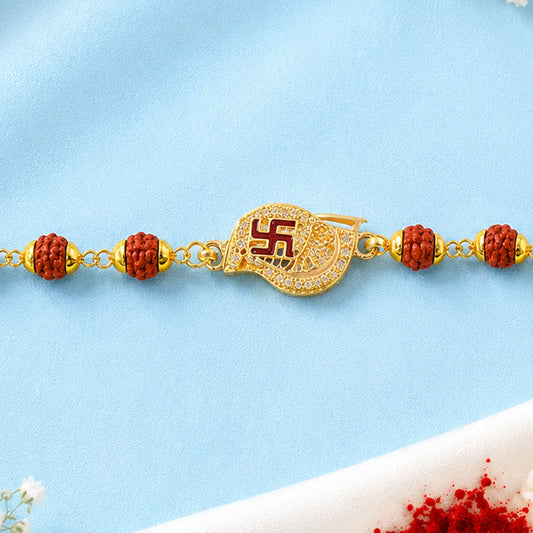 A Swastik Rudraksha Bracelet Rakhi with a CZ pendant displayed on a wrist.