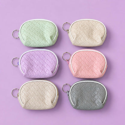 Mini pouch holding coins and small essentials