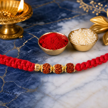 Red Thread Rakhi with a Row of Natural Rudraksha Bead Pendant