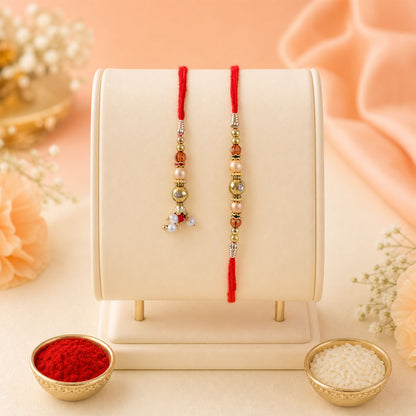 Couple Rakhi Hanging Pair with Pearl Drops, Gold Accents and Beaded Layers