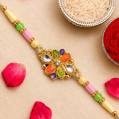 Orange and Green Enamel Flower Pendant Rakhi with Kundan Teardrop Stones