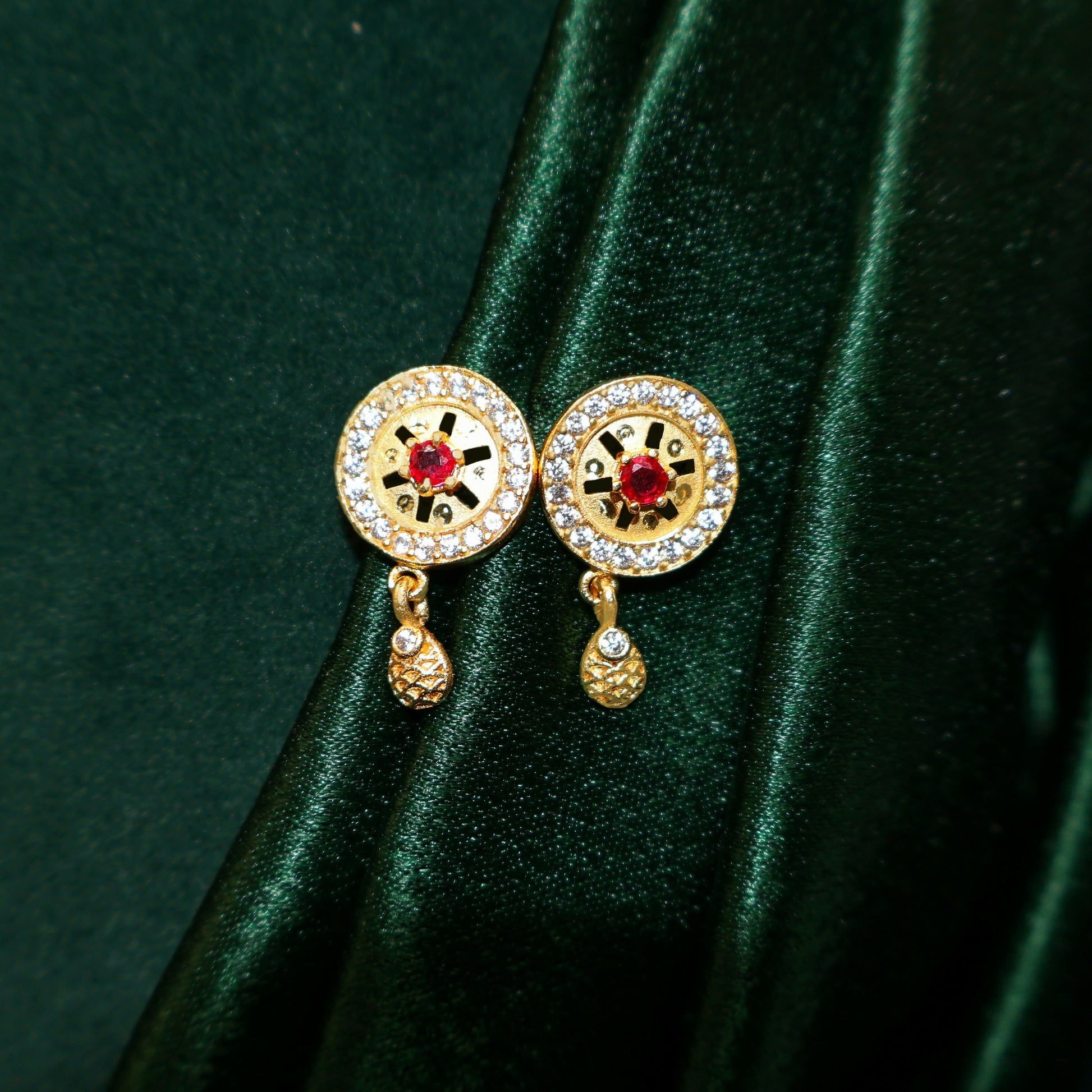 Gold Plated Round Pendant Forming Necklace Set with Ruby Stone & AD Detailing