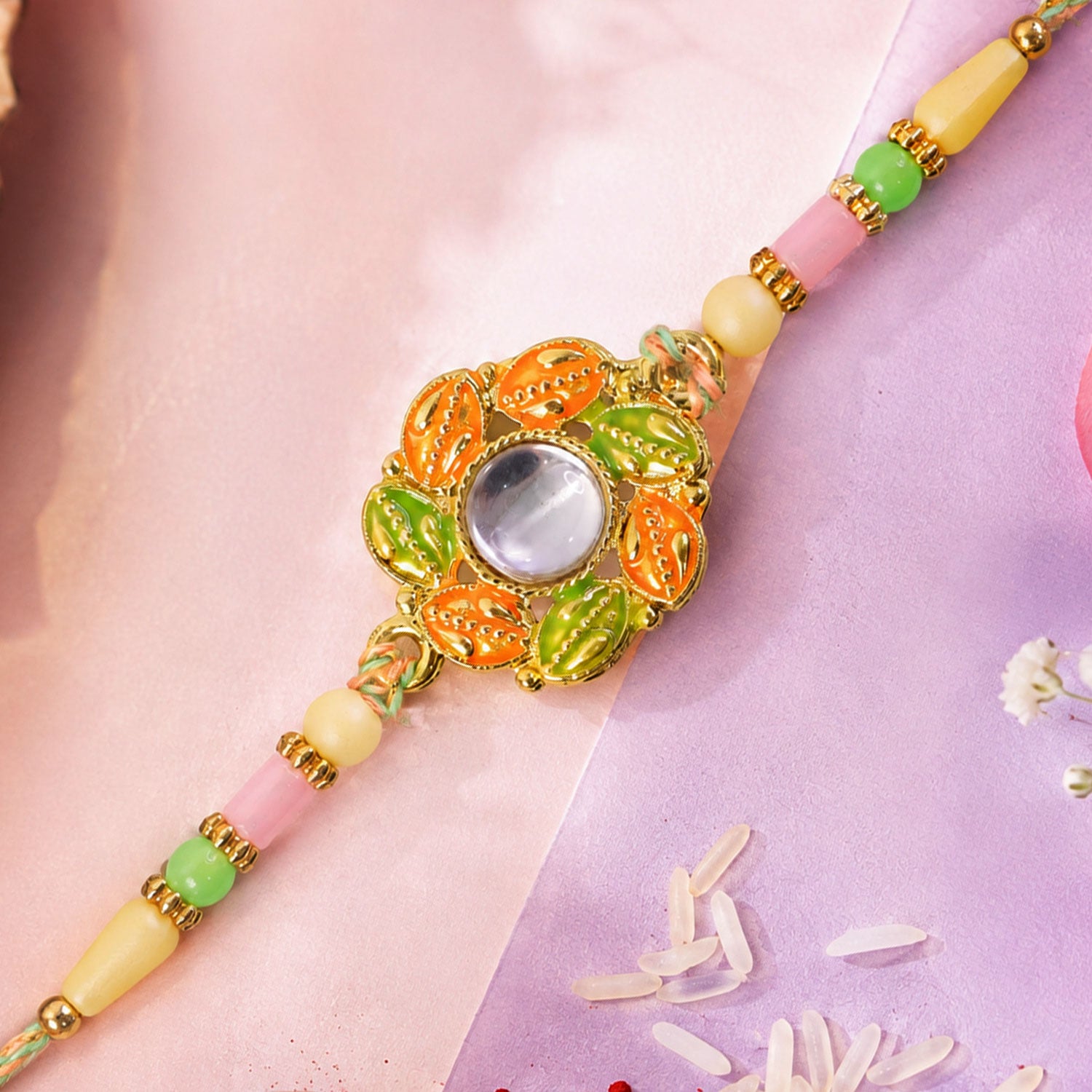 Gold Leaf Kundan Pendant Rakhi with Rudraksha Beads