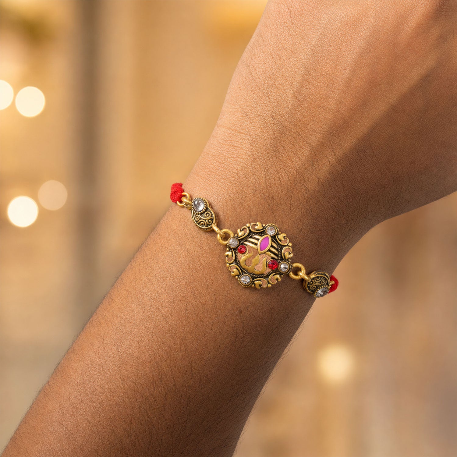 Premium Rakhi showcasing Ornate Floral Medallion, gold trims and gift style for Gift