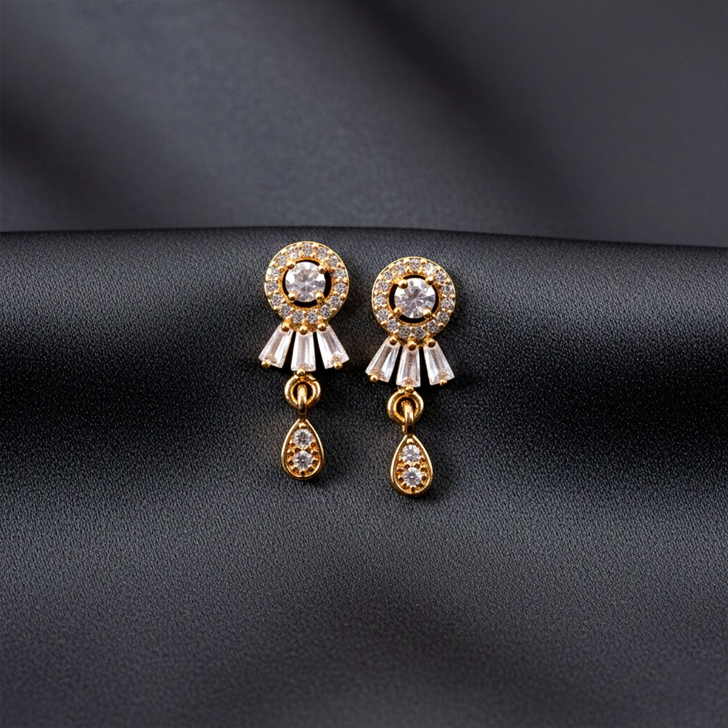 Gold plated CZ stud drop earrings front view showcasing elegant round stones