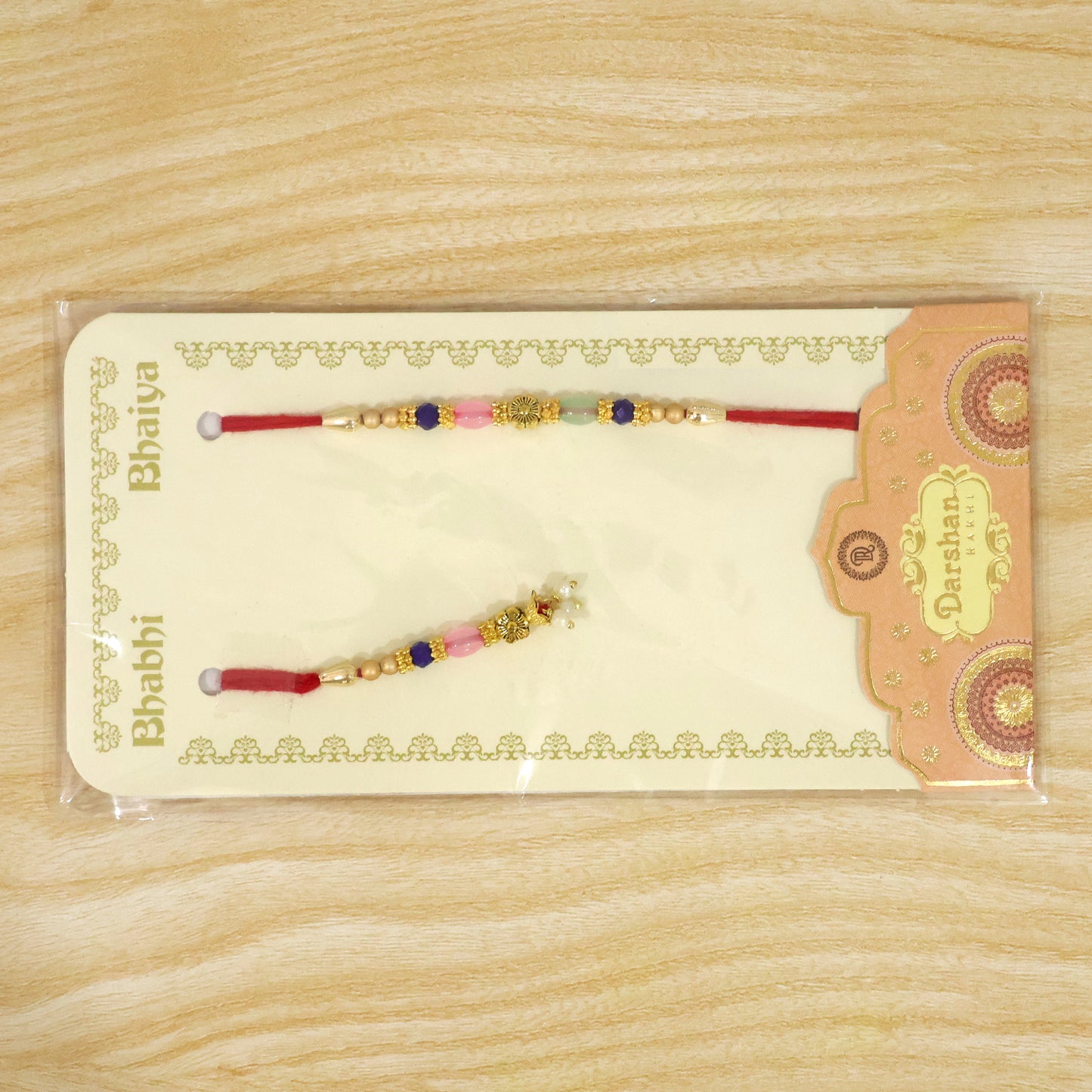 Graceful Floral Cluster Bhai Bhabhi Rakhi with Flower and Pearl Drop for Gifting