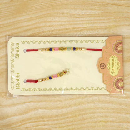 Graceful Floral Cluster Bhai Bhabhi Rakhi with Flower and Pearl Drop for Gifting