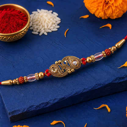Antique Twin Paisley Kairi Motif Kundan Rakhi with Rudraksha & Crystal Beads