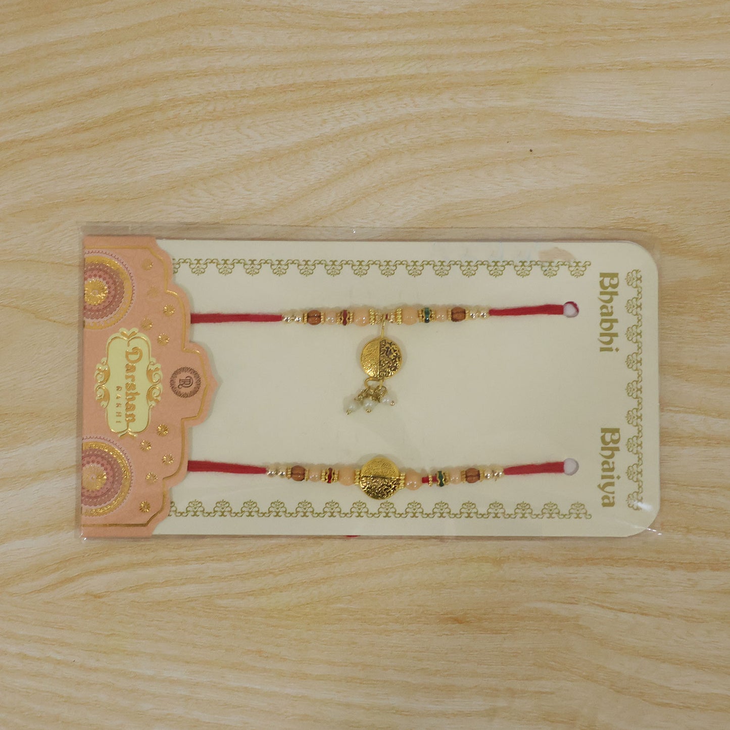 Divine Bracelet Wrist Bhai Bhabhi Rakhi with Medallion and Hand Display for Gifting