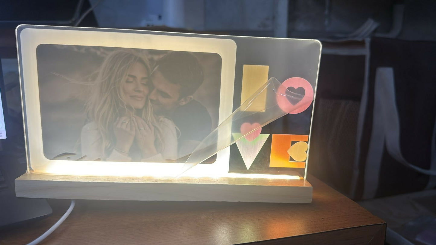 LED Love Photo Frame Lamp with wooden base on bedside table
