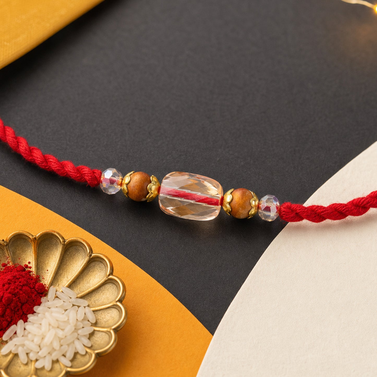 Red Thread Rakhi with Wooden and Sparkling Crystal Bead Pendant
