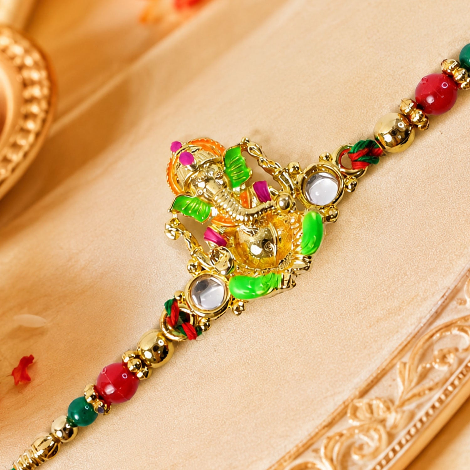 Colorful Ganesh Rakhi with Red Green Beads and Auspicious Festive Gifting Appeal