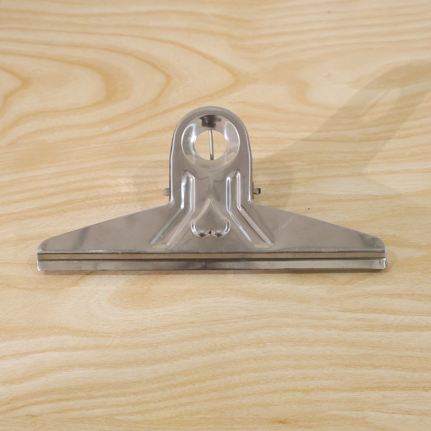 Metal paper binder clip view 9
