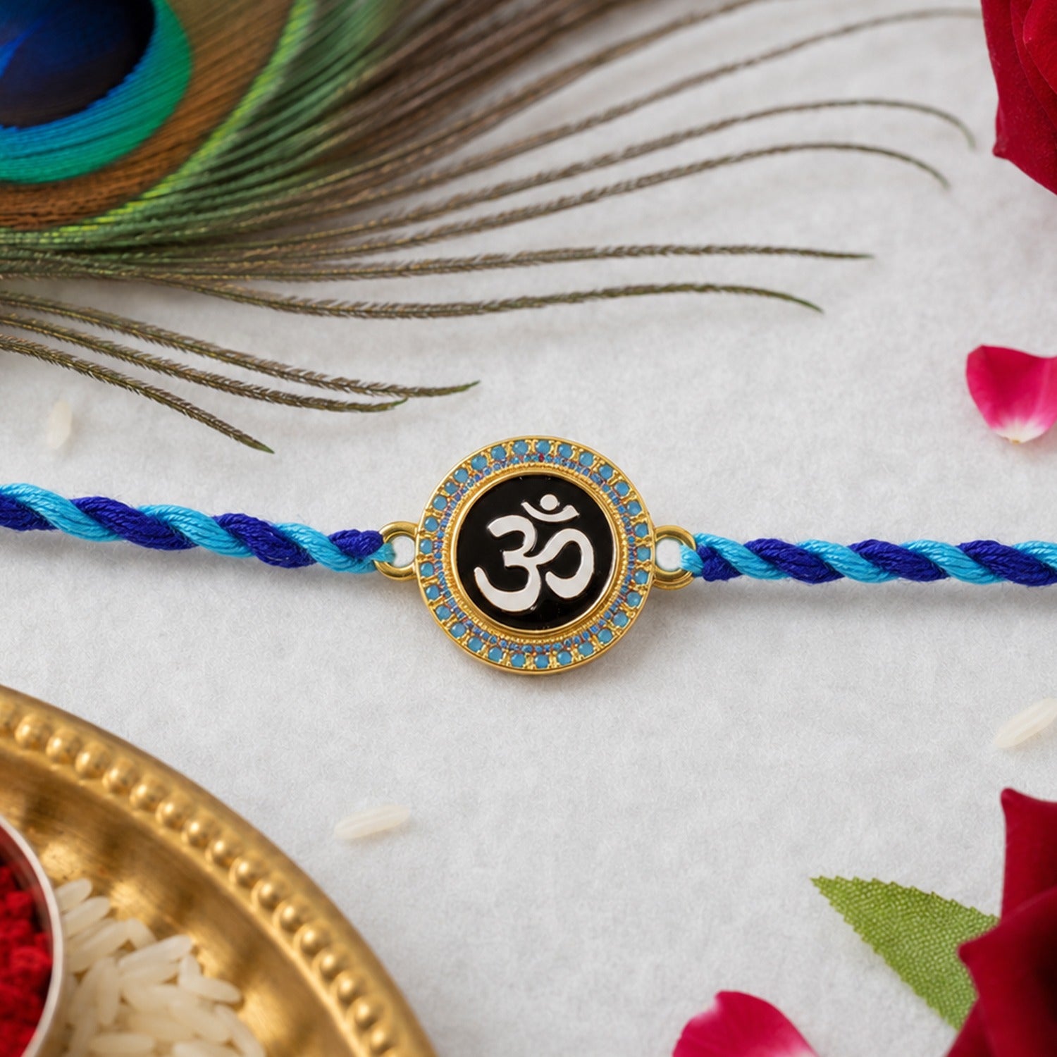 Blue Om Symbol Fancy Dori Rakhi for Brother this Rakshabandhan